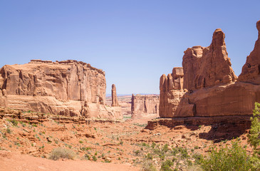 Fototapeta premium Hot stone desert of Utah, USA. Valley in Arches National Park 