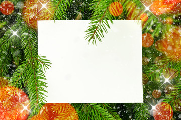 Natural frame of fir branches, snow and light. The concept of a festive mood, Christmas and New Year. Copy space, place for text.