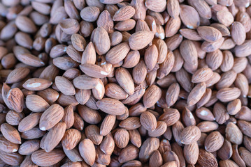 fresh dry peeled almond nuts.Background.