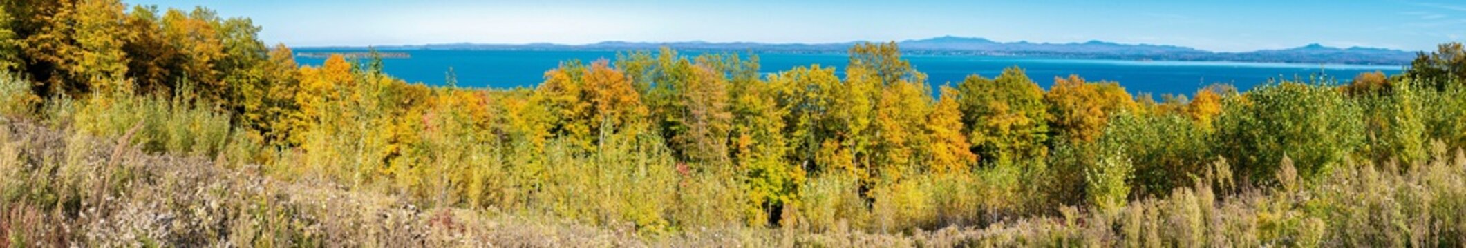 Panoramic view of Lake Champlain with Vermont state in background in late fall © Guy