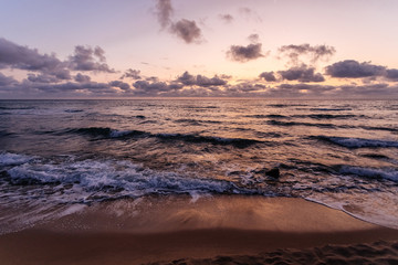 Fototapeta na wymiar Beautiful cloudscape over the sea, sunrise