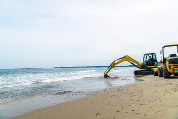 Construction equipment at the beach,