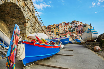 Fototapeta na wymiar Colorful boats in Manarola, Italy