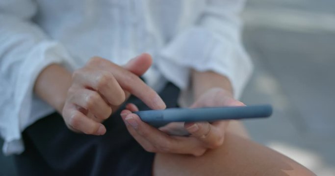 Work everywhere at outdoor, woman use of mobile phone