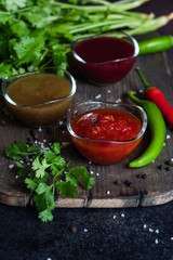 Georgian sauces on stone background