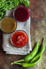 Georgian sauces on stone background