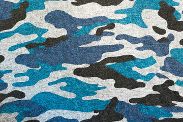 BLUE BLACK CAMOUFLAGE FABRIC TEXTURE BACKGROUND. military and hunting clothes
