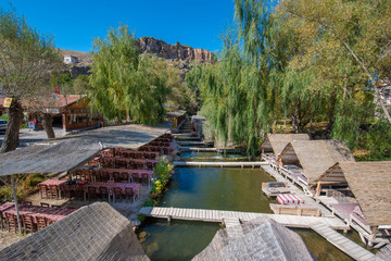 Cappadocia, Turkey - Beautiful floating Turkish restaurants on the river at Belisırma. The village at the end of Ihlara Valley. 