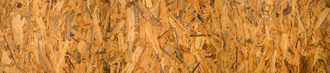 plywood wall background or texture. Natural pattern wood background.Compressed light brown wooden texture  concept.