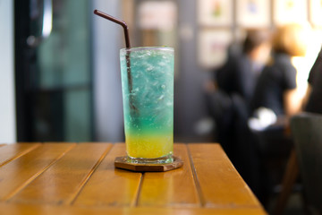 blue cocktail soda on wooden table