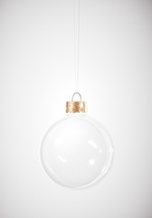 Glass Christmas bauble hanging on white background for winter holiday greeting card. Design...