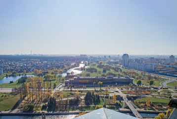 City architectural landscape Minsk. Office buildings of the road and parks. View from the roof with blue sky.