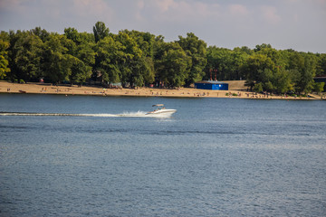 Tour of Kiev in the center of Europe. View of the Dnieper, Trukhanov island and a foot bridge. Park...
