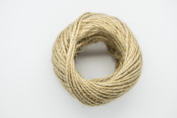 A roll of light brown color string
