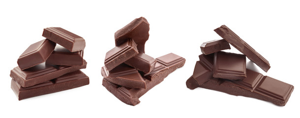 Delicious chocolate pieces on white background