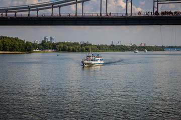 Tour of Kiev in the center of Europe. View of the Dnieper, Trukhanov island and a foot bridge. Park...