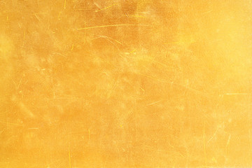 Obraz na płótnie Canvas Gold abstract background or texture distress scratch and gradients shadow