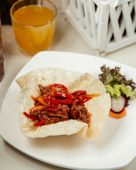 meat fajitas with vegetables with orange juice