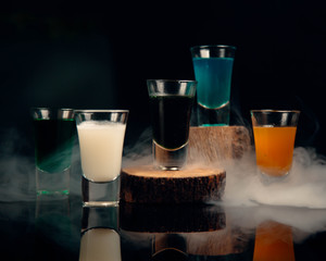various cold beverages in shots on the table © Kamran