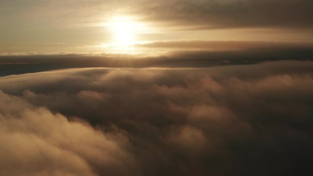 Incredible sunrise aerial background view over Japan above clouds