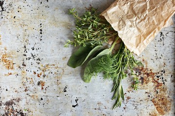 Herbs and spices.Fresh herbs selection included rosemary, thyme, sage and oregano. Overhead view,...