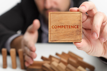 Business, technology, internet and network concept. Young businessman points to the keyword: