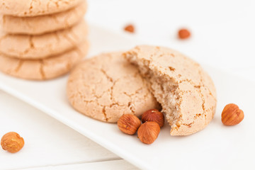 Delicious homemade cookies with walnuts on white background 