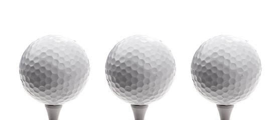 Drei Golfbälle
