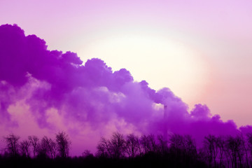 plant emits smoke and smog from the pipes at mist cloudy, pollutants enter the atmosphere. Environmental disaster. Harmful emissions into. Exhaust gases. the purple smoke 