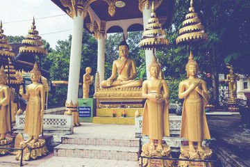 Obraz premium Laos, Old Buddha image in Wat Sisaket popular place to visit in Vientiane city and landmark, Old buddha statue in laos (Vientiane, Laos)