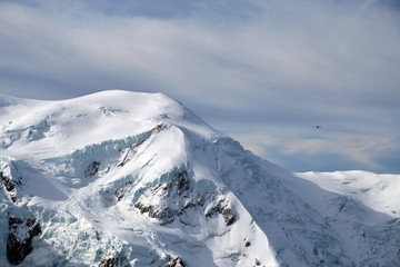 Fototapeta na wymiar Mont Blanc massif and a helicopter.