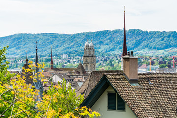 Panorama of city view of old downtown of Zurich city, with beautiful house and Grossmunster (Great...