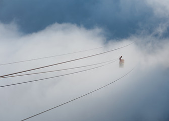 Cable car ride in the clouds.