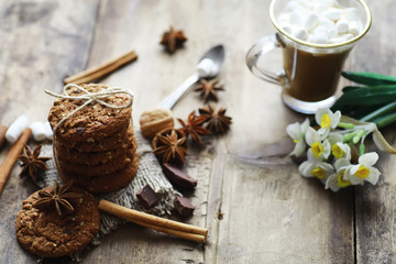 Coffee table. Cup with a hot coffee drink. A set of fragrant cookies for breakfast for the holiday.