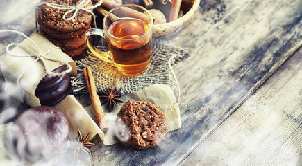 Coffee table. Cup with a hot coffee drink. A set of fragrant cookies for breakfast for the holiday.