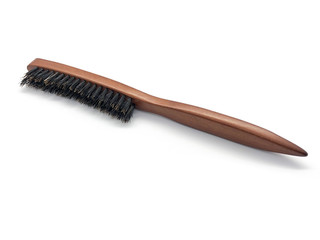 Professional hairdresser wooden backcombing brush isolated on white background. 