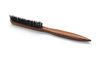 Professional hairdresser wooden backcombing brush isolated on white background. 