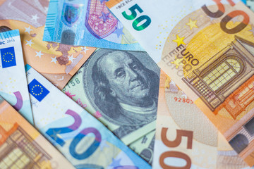 Fototapeta na wymiar US dollar money around with Euro money