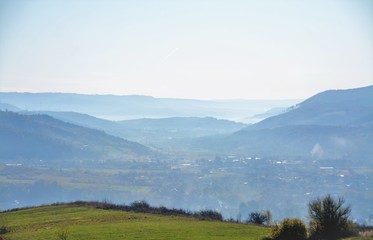 fog in the valleys over the village