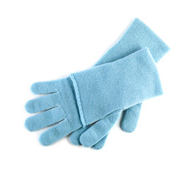 Stylish blue gloves on white background, top view. Autumn clothes