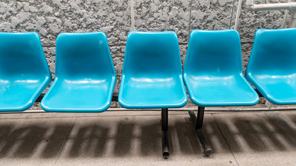A blue bench in a hospital chair in Thailand