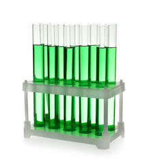 Test tubes with green liquid on white background