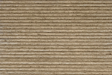 Cross section of thin fiberboard in a stack as a background, texture
