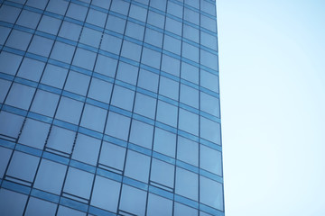 Buildings made of glass and concrete. Skyscrapers in the city.