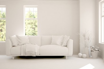 Mock up of stylish room in white color with sofa and green landscape in window. Scandinavian interior design. 3D illustration