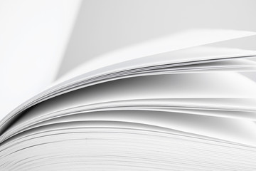 Pages of open new book, closeup view