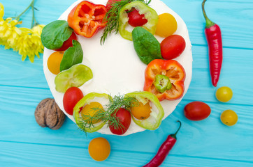 Appetizing cake with chicken meat, eggs and salad. Snack unsweetened cake. Pancake unsweetened cake.