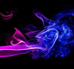 Colored smoke on black background