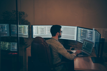 Photo of it-specialist working on global project using laptop testing alpha version of newly...