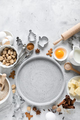 Christmas or Xmas baking culinary background. Ingredients for cooking on kitchen table. New Year or Noel holiday festive decorations